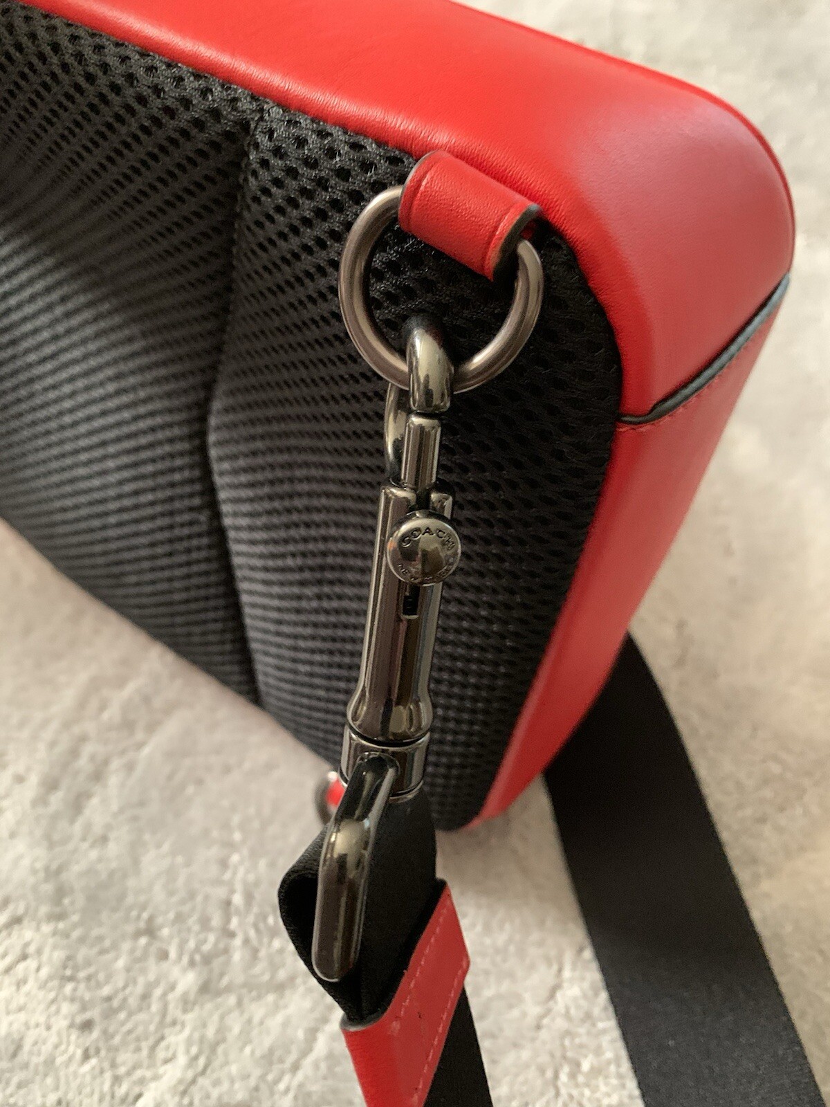 COACH Track Sling Backpack in Colorblock with Stamp in Red Ivory Orange