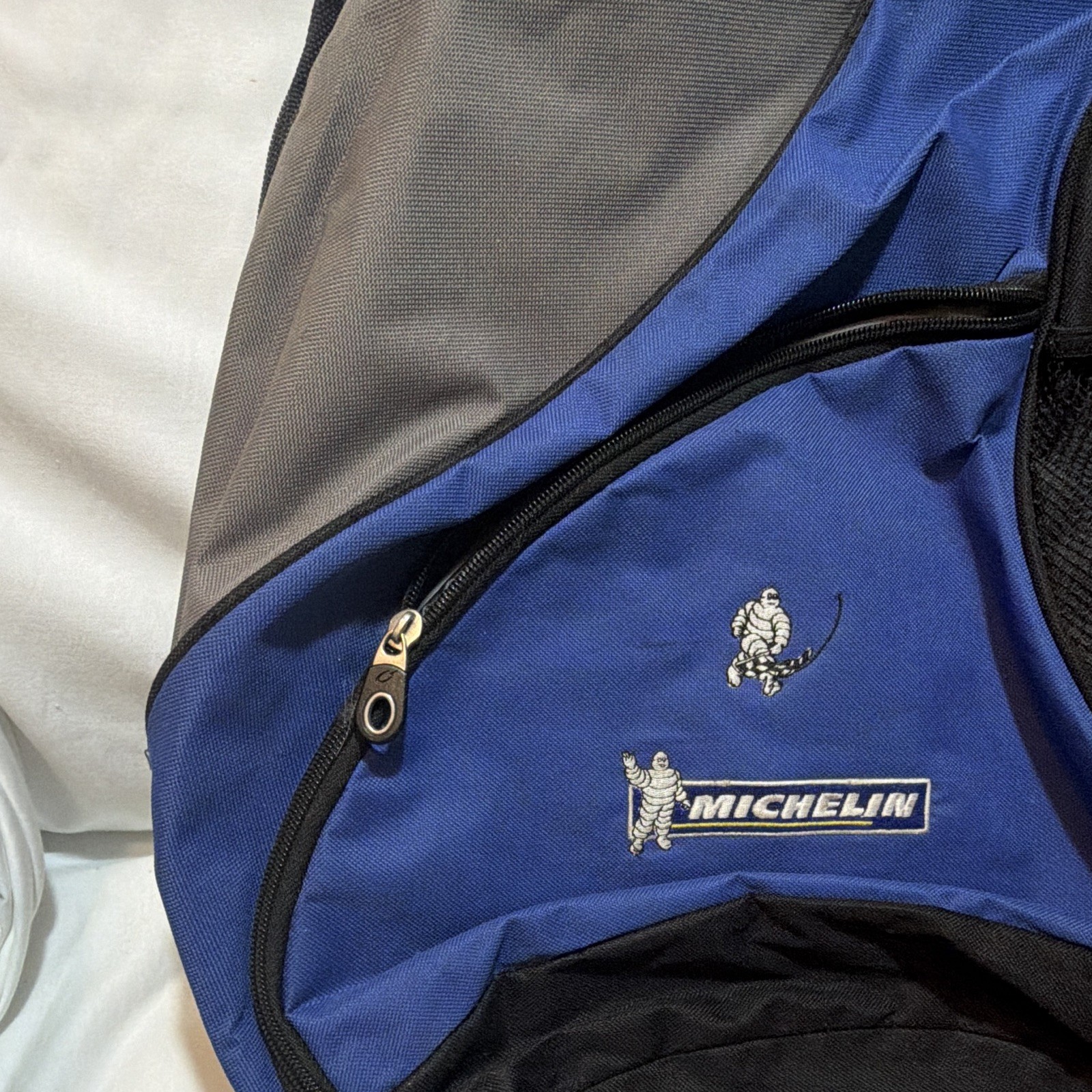Michelin Racing Bibendum Single Strap Backpack BlueGreyBlk Multi Pocket Gemline
