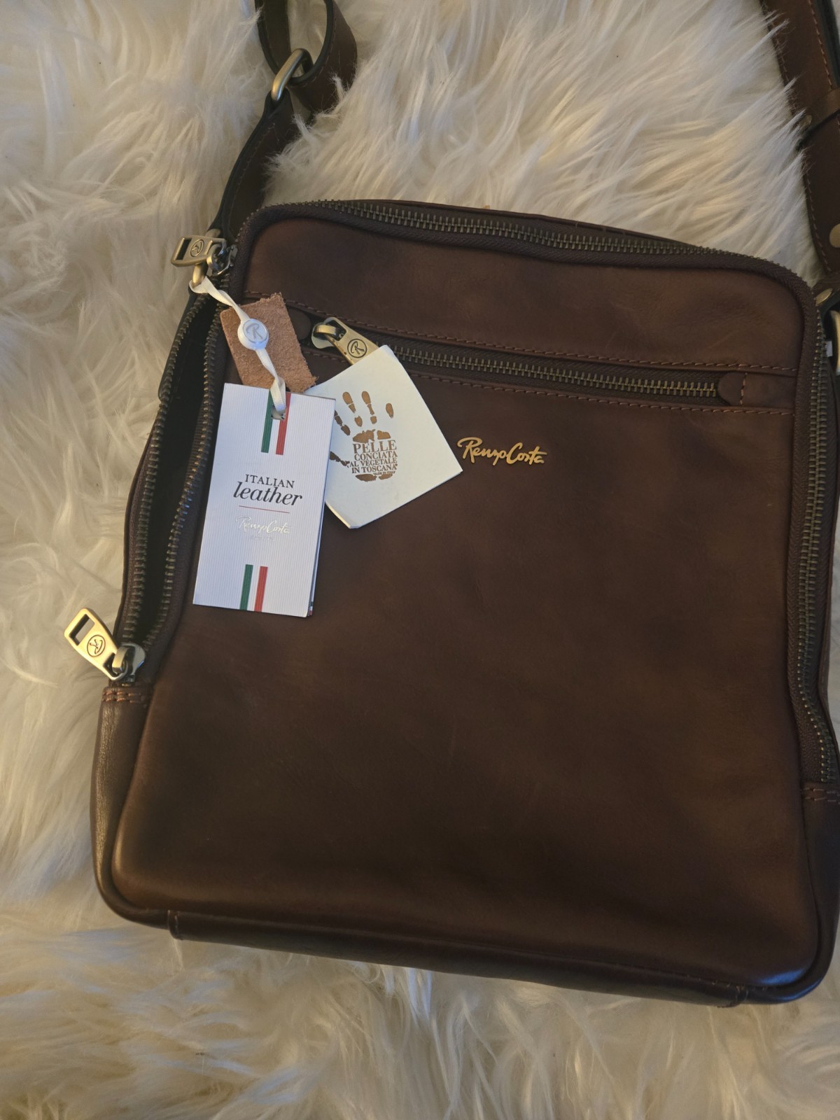 New Renzo Costa Medium embossed leather crossbody bag with tags.