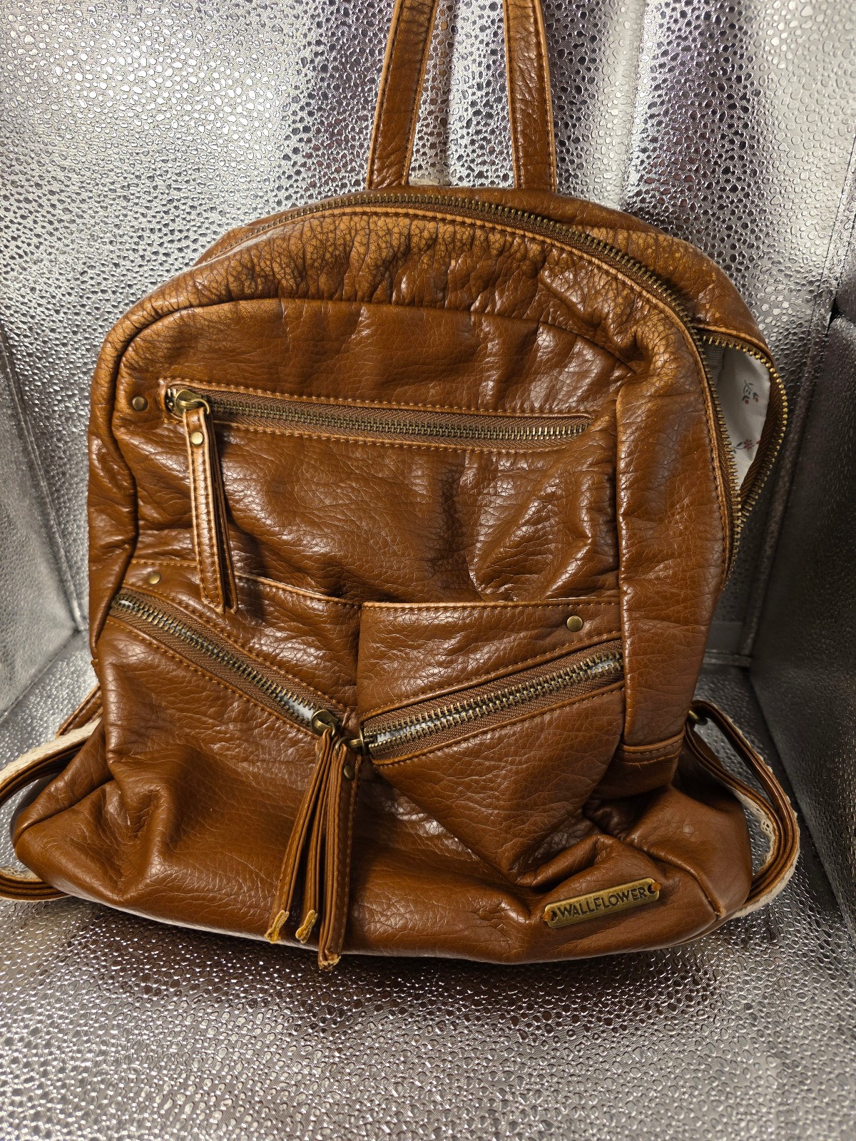 brown faux-leather WallFlower brand backpack