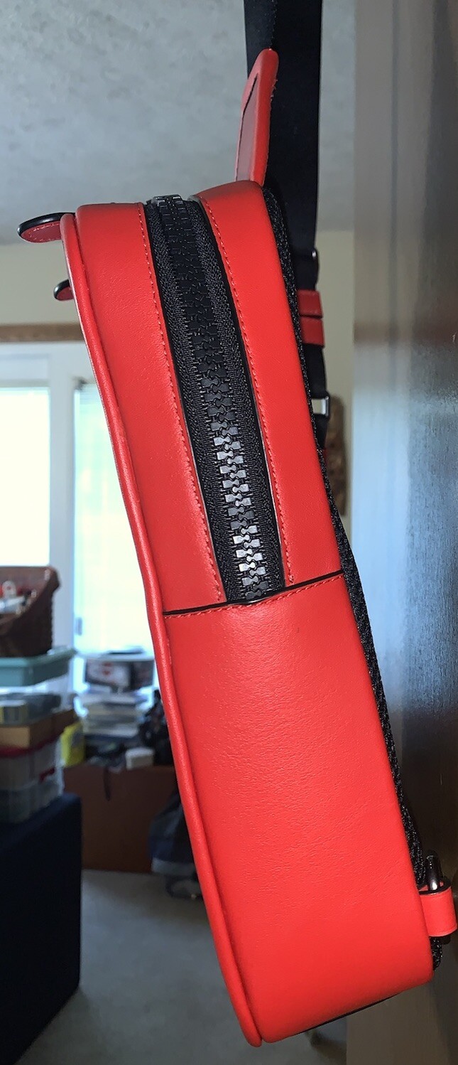 COACH Track Sling Backpack in Colorblock with Stamp in Red Ivory Orange