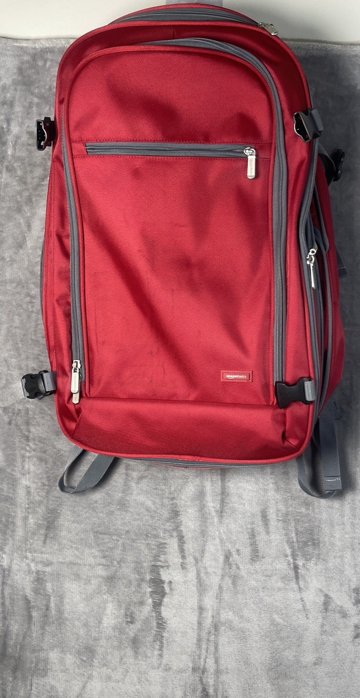 Amazon Basic Carry On Travel Backpack Multi Carry Option Red ( Dirty On Front